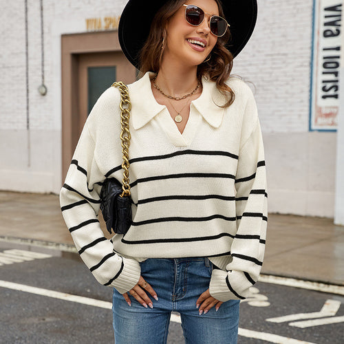 Casual sweater for ladies with a modern V-neckline and a chic striped pattern.