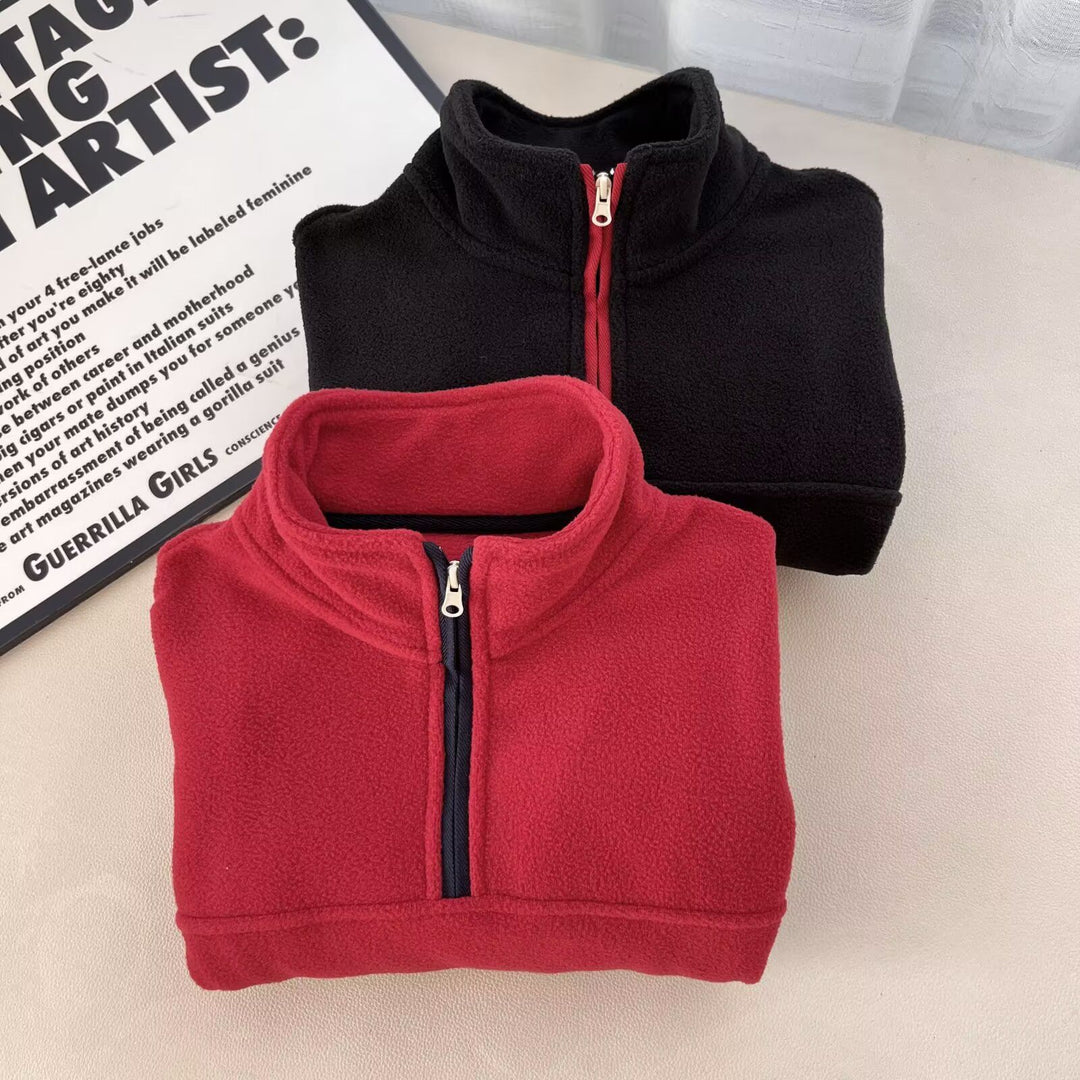 Pull en polaire pour femmes avec col montant et poches zippées pratiques Chic & Stil