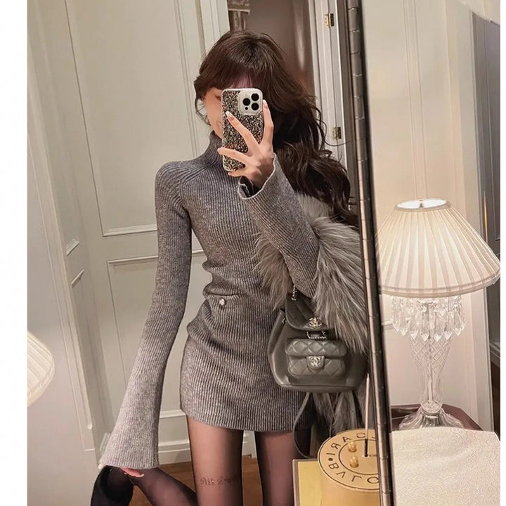 Women’s knitted dress with high collar and wide sleeves Chic & Stil