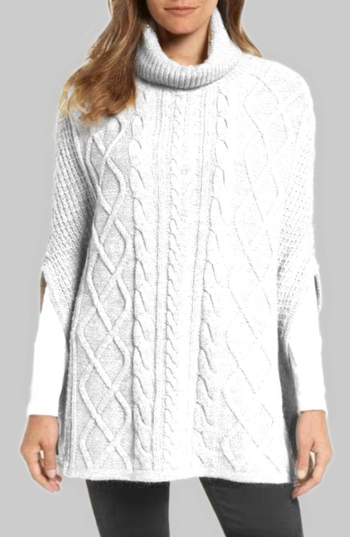 Knitted poncho for women with high collar and classic cable knit pattern Lune London
