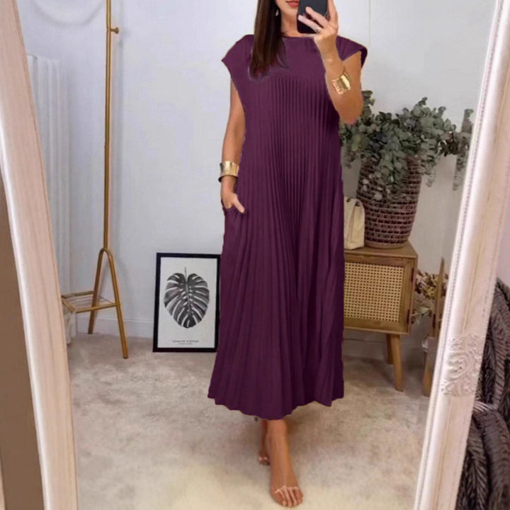 Maxi dress for women with pleated details and side pockets Style and elegance