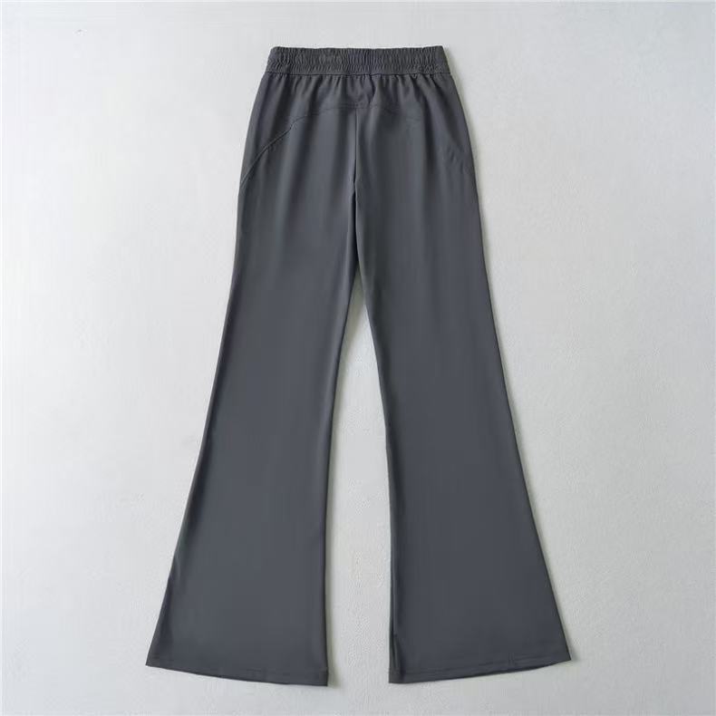 Pantalons évasés sportifs pour femmes avec taille élastique et poches pratiques Chic & Stil
