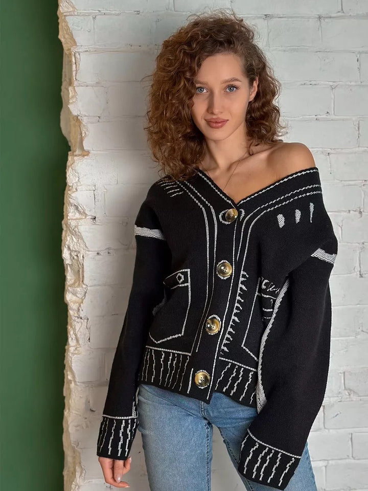 Cardigan pour femmes avec design asymétrique et boutons contrastés Chic & Stil