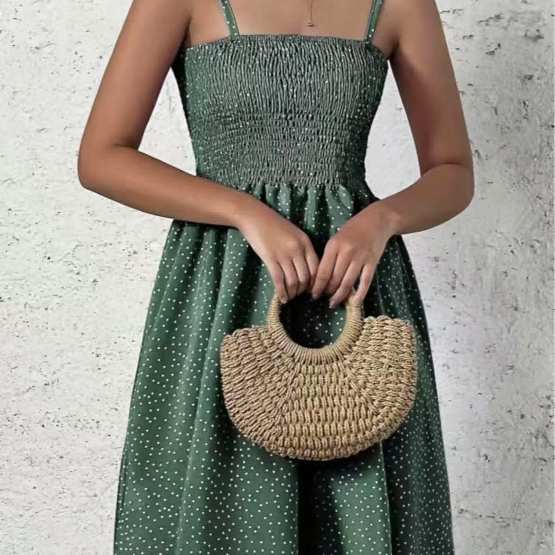 Halter neck dress for women with an airy silhouette and a lovely polka dot pattern Lune London