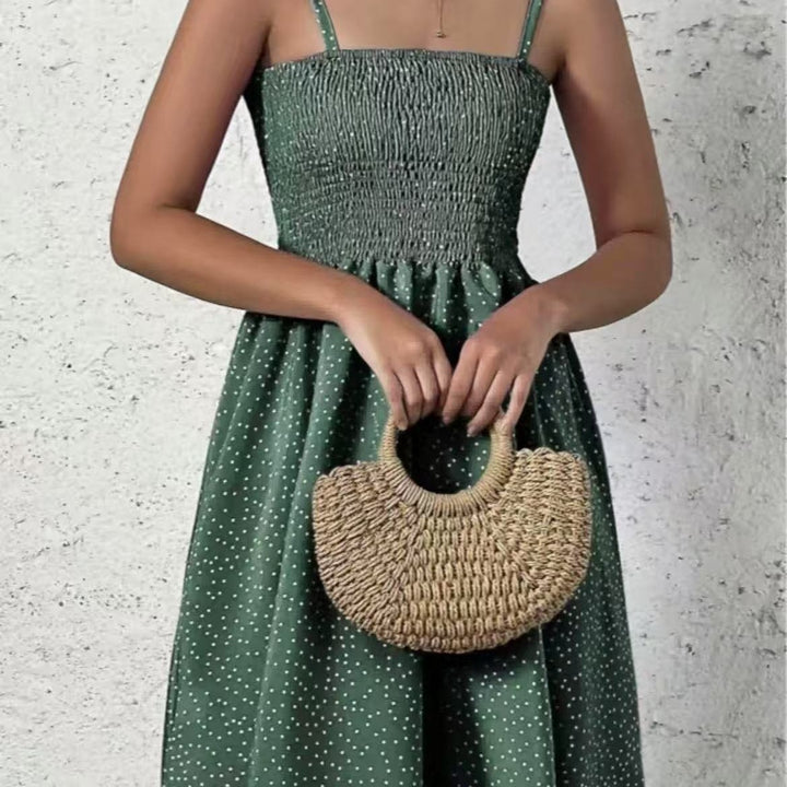 Halter neck dress for women with an airy silhouette and a lovely polka dot pattern Lune London