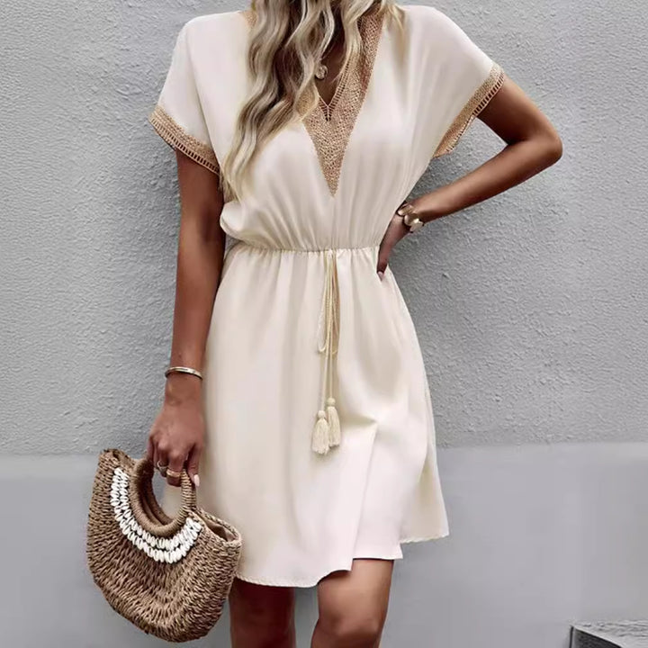 Leisure dress for women with V-neckline and decorative details Lune London