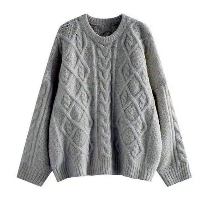 Women Large knitted sweater with cable pattern and loose fit Chic and Style