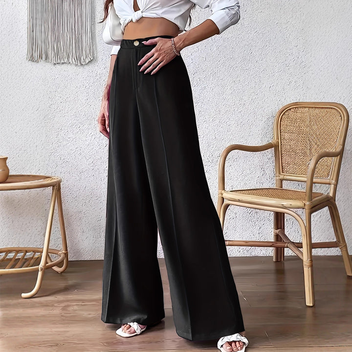 High-waisted Palazzo pants for women, with a fitted waist and discreet button detail Lune London