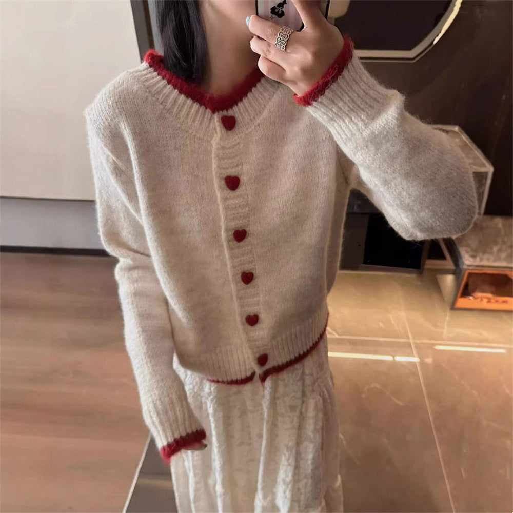 Ladies cozy knit vest with heart-shaped buttons and refined sleeve design Lune London