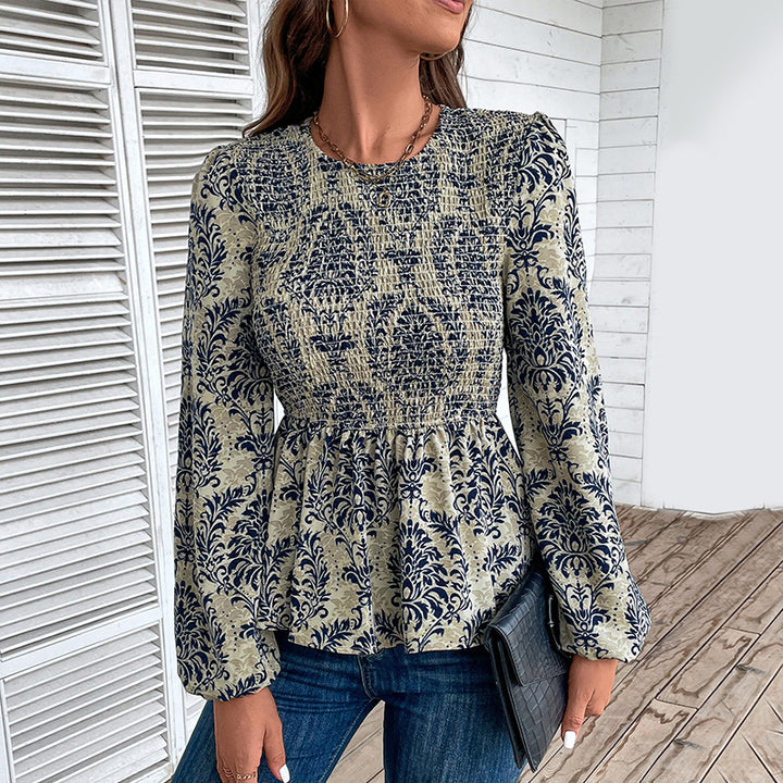 Elegant shirt for women with voluminous sleeves and a floral pattern Lune London