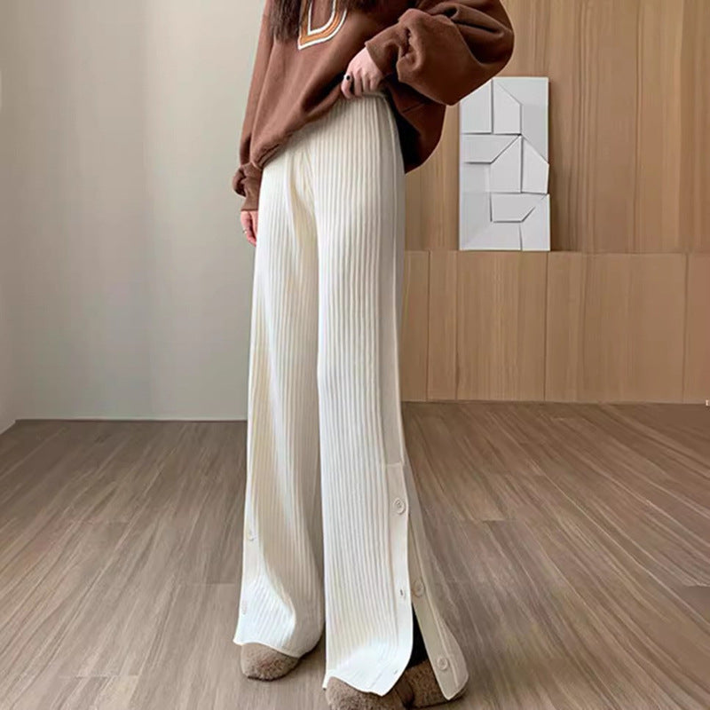Pleated palazzo pants for women with button details Lune London