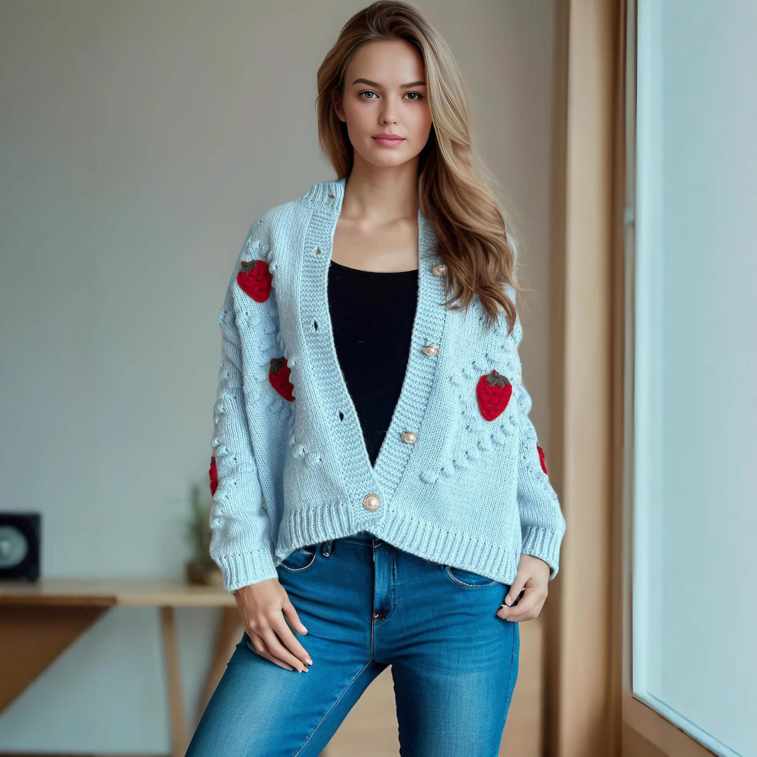 Knit jacket for women with a playful strawberry pattern and Lune London button details