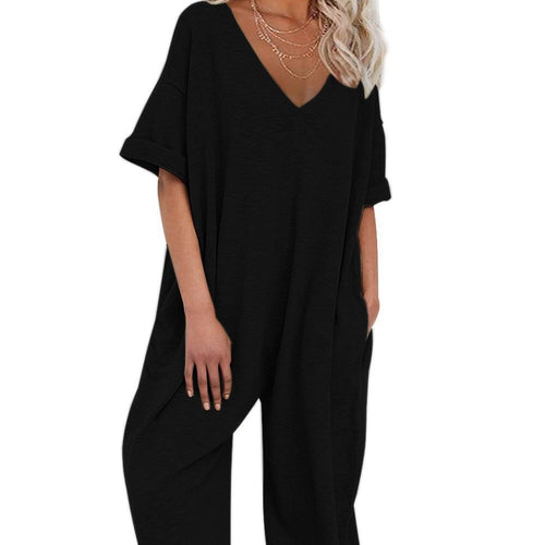 Oversized jumpsuit for women with deep V-neckline and casual pockets Lune London
