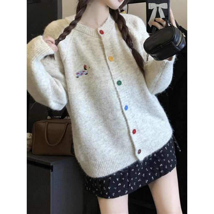 Knitted jacket for women with colored buttons and an embroidered pattern Lune London