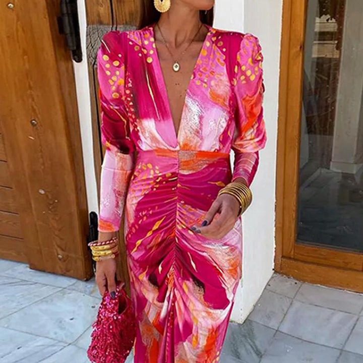 Robe maxi pour femmes avec un élégant décolleté en V et des manches bouffantes luxueuses Chic & Stil