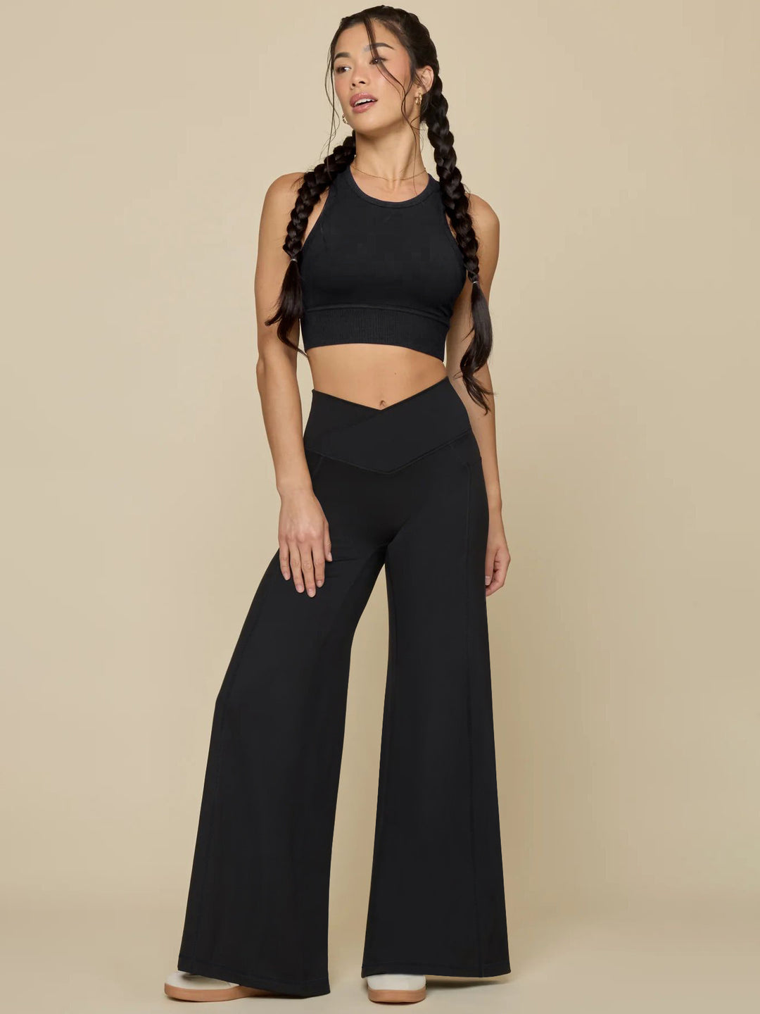 Elegant high-waisted casual trousers for women, with wide legs and practical pockets Lune London