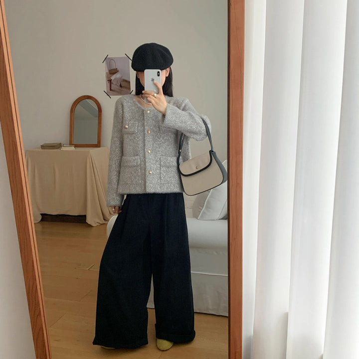 Veste en tricot confortable pour femmes avec détails en bouton et poches plaquées Chic & Stil