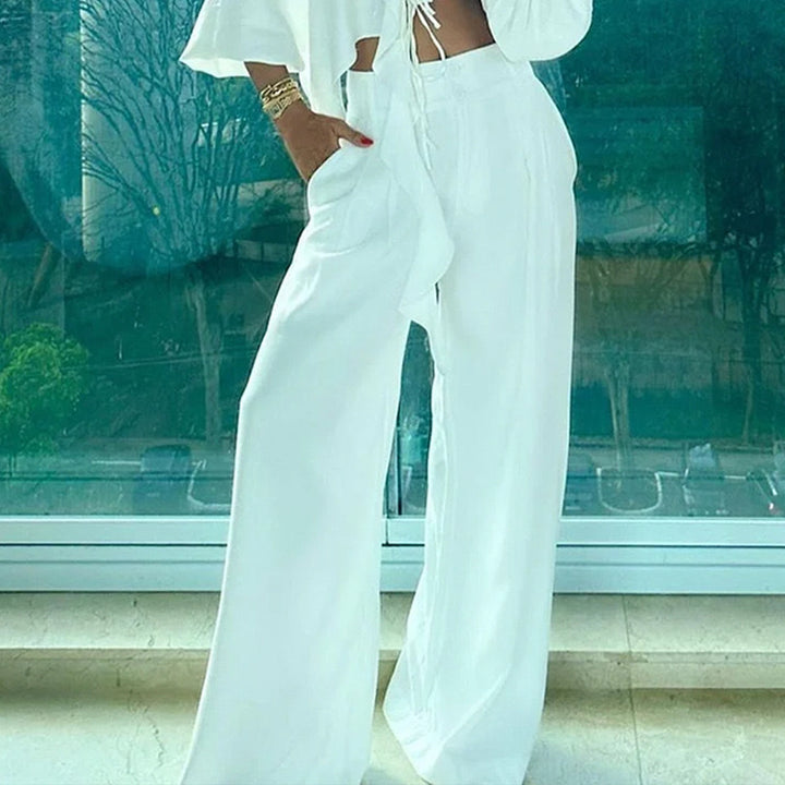 Ladies two-piece set with asymmetric cropped top and wide pants