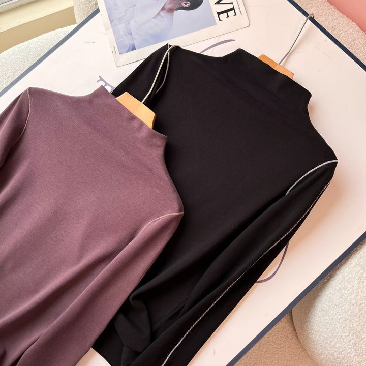 Chemise polo à manches longues sportive pour femmes avec solution de col élégant Chic & Stil