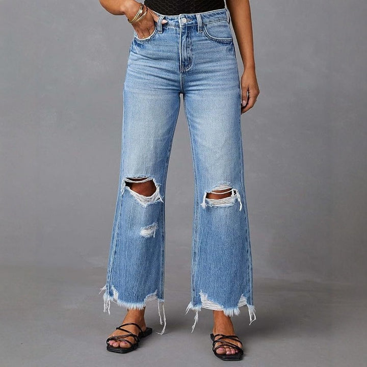 Women's Flared Jeans with Stylish Ripped Details and Frayed Hems Lune London