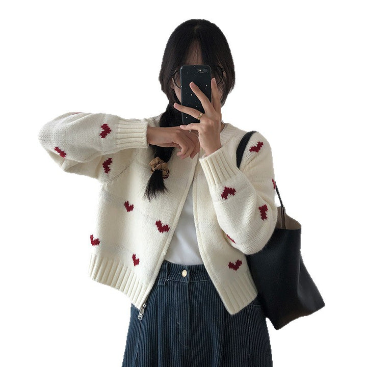 Ladies comfortable cardigan with heart pattern and chic style elegant button detail