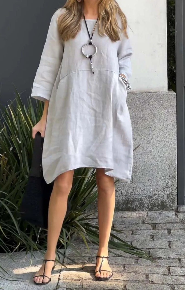 Casual linen dress for women with practical pockets and asymmetrical hem Lune London