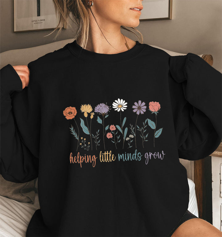 Sweat-shirt femme avec des manches volumineuses et un imprimé floral motivant Chic & Stil