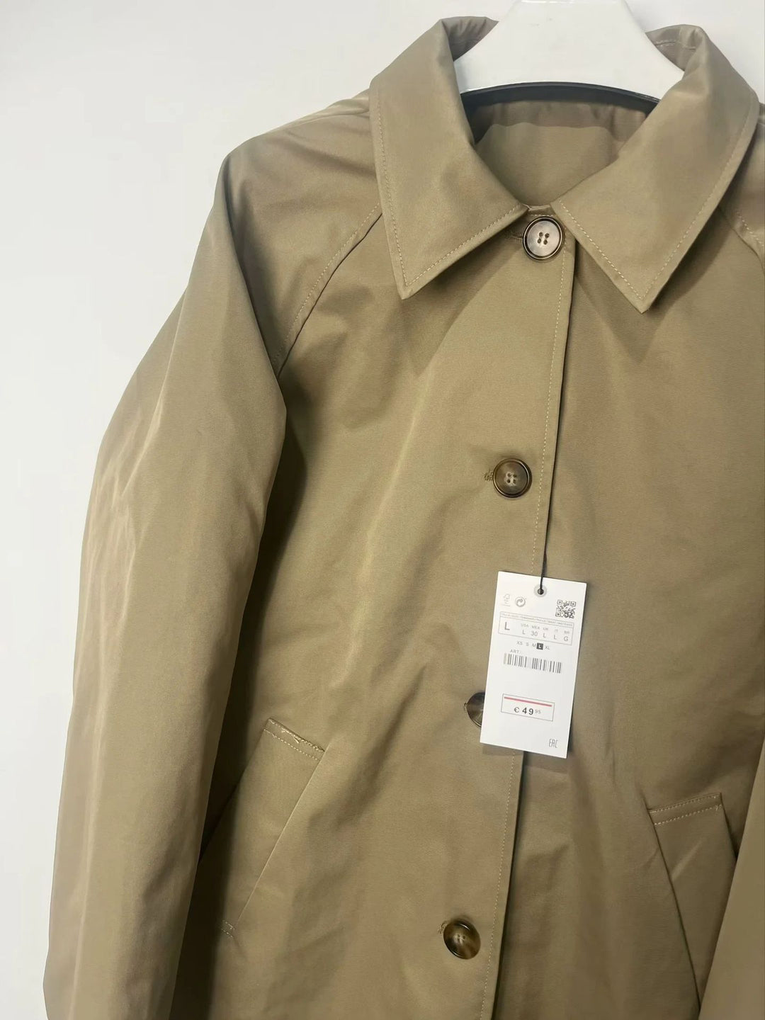 Transitional jacket for women with elegant high collar and practical button details Lune London