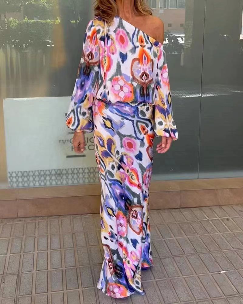 Robe maxi élégante pour femmes à coupe asymétrique avec manches lisses Chic & Stil