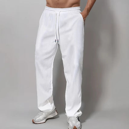 Men's Sporty Relaxed Fit Jogging Pants with Elastic Waistband and Side Pockets Chic & Stil