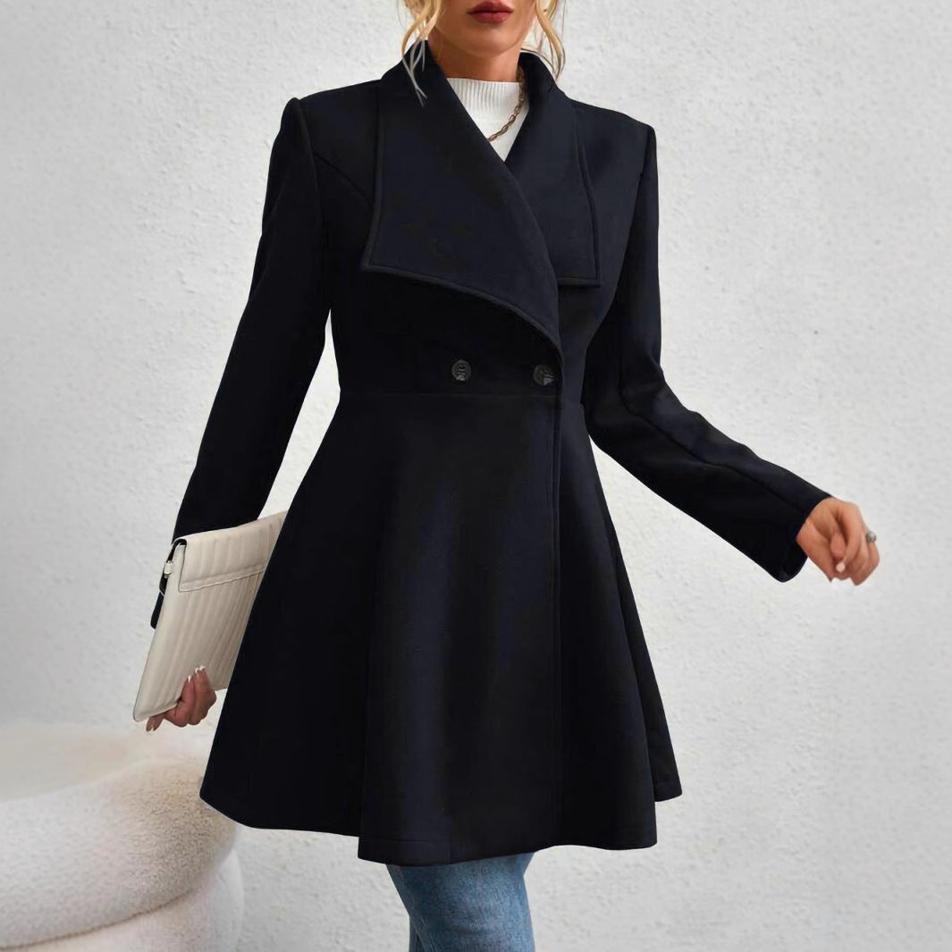 Ladies elegant wool coat with a loose and cinched silhouette and modern button details Lune London