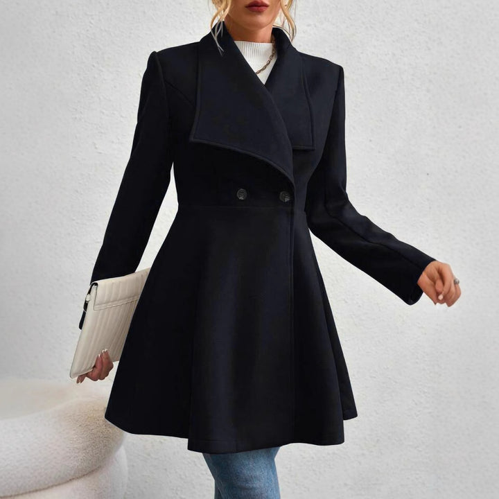 Ladies elegant wool coat with a loose and cinched silhouette and modern button details Lune London