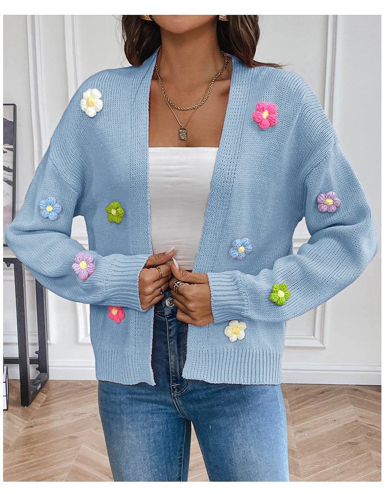 Ladies casual knitted cardigan with colorful flower appliqués Lune London