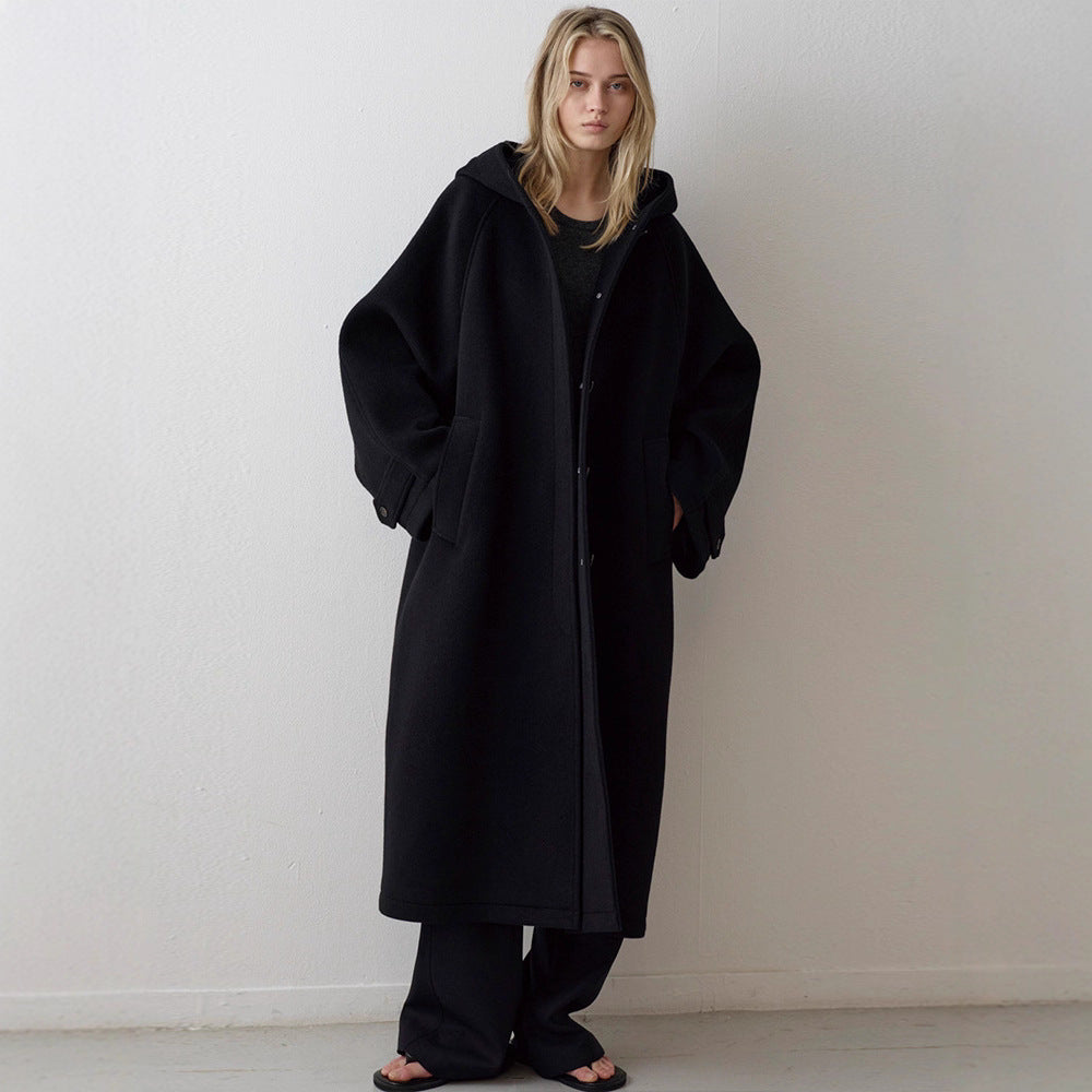 Manteau surdimensionné élégant pour femmes avec capuche et poches pratiques Chic & Stil