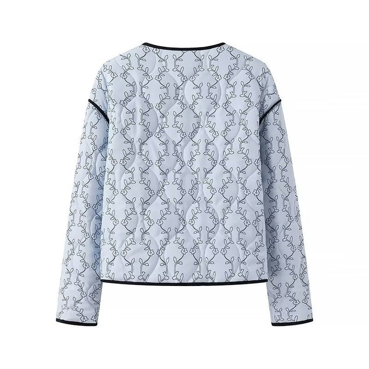 Veste matelassée pour femmes avec un motif graphique moderne et une coupe ajustée Chic & Stil