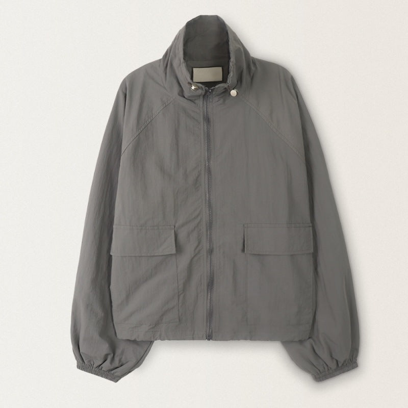 Women's sporty transitional jacket with high collar and practical pockets Chic & Stil