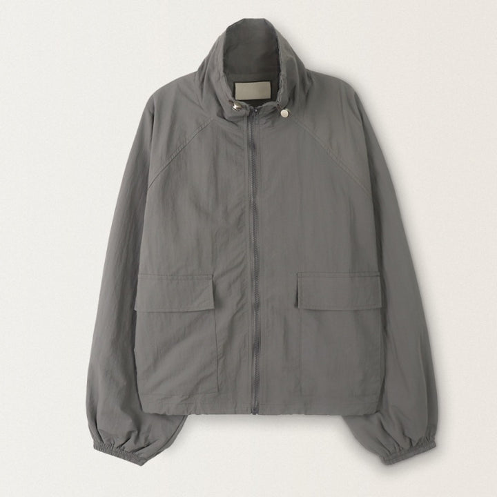 Women's sporty transitional jacket with high collar and practical pockets Chic & Stil