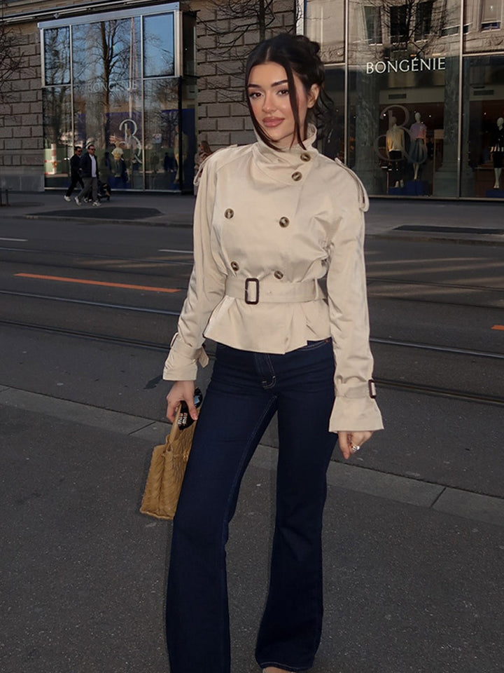 Women's trench coat with a belted waist and decorative button details Lune London