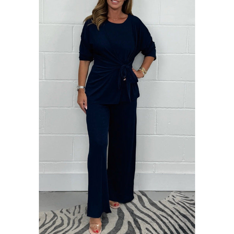 Elegant set for women in a fluid and soft material with a fitted top and loose pants Lune London