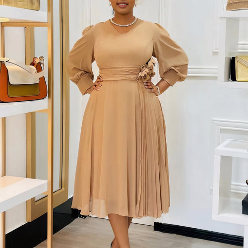 Elegant dress for women with decorative floral accent and draping Lune London