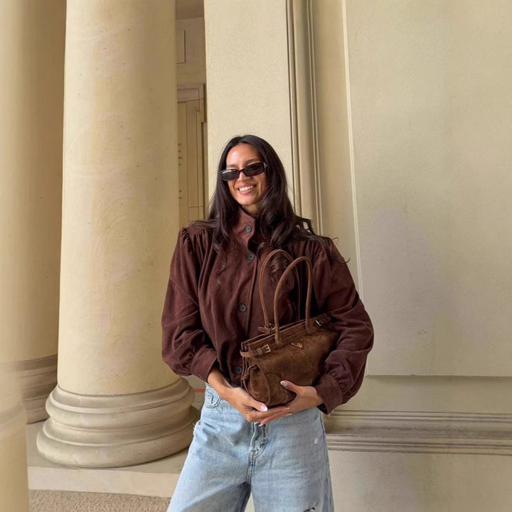 Oversized blouse for women with a chic pleated design and elegant button details Lune London