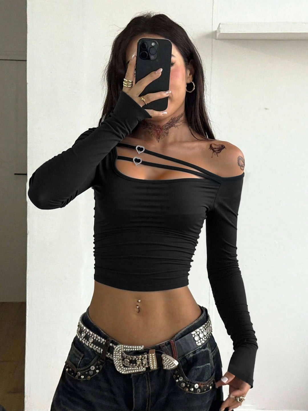 Elegant asymmetrical top for women with refined strap details Chic & Stil