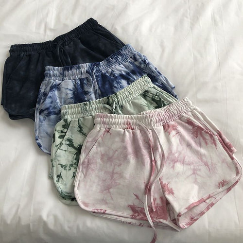 Women’s casual sweat shorts with trendy tie-dye design and practical side pockets