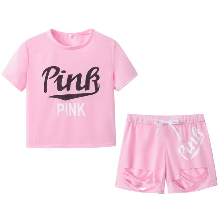 Ensemble t-shirt et short pour femmes sportif avec coupe décontractée et imprimés contrastés Chic & Stil