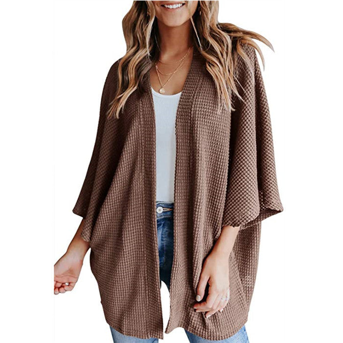 Ladies casual knit kimono with a loose fit and chic casual design