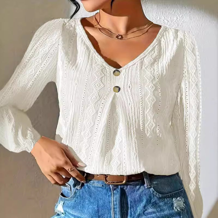 Women’s top with textured surface and elegant button detail Lune London