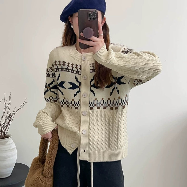 Chunky knit cardigan for women with decorative cable pattern and button details Lune London