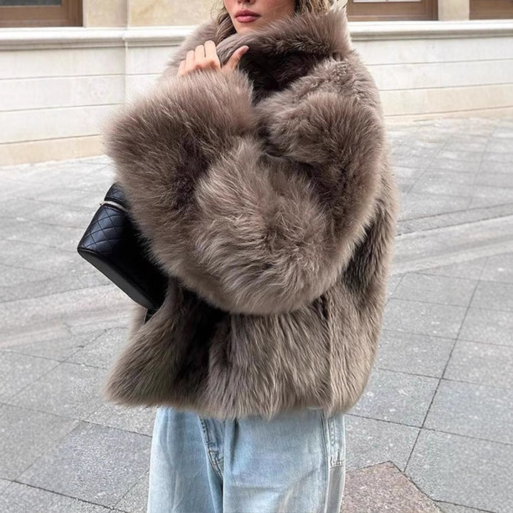 Ladies faux fur coat with high collar and luxurious design Lune London