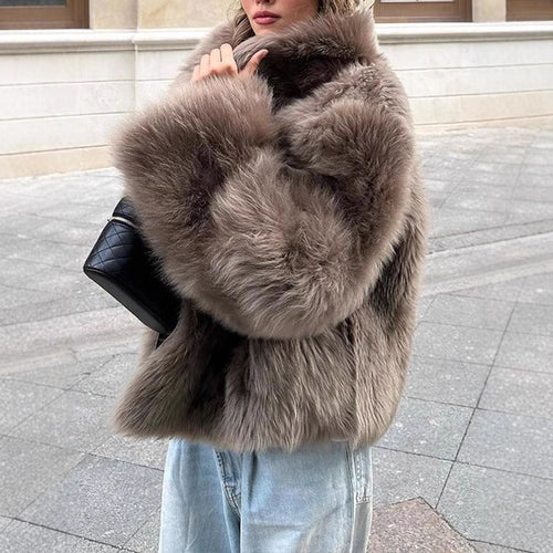 Ladies faux fur coat with high collar and luxurious design Lune London