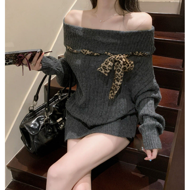 Chunky knit sweater for women with off-the-shoulder design and playful bow accent Lune London